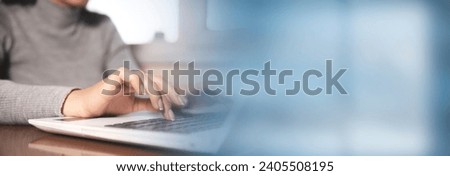 Business woman hands typing on laptop computer keyboard