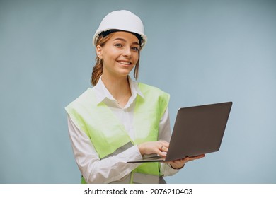 Business Woman In Hard Hat Using Laptop
