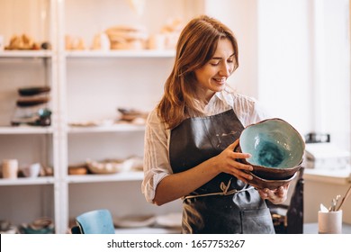 Business woman at her pottery store