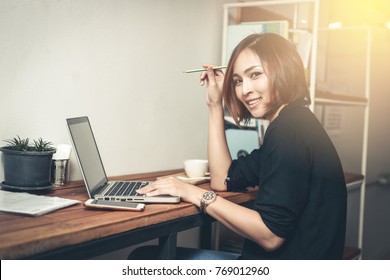 Business  woman holding digital tablet  at office desk in office    Business working online concept - Shutterstock ID 769012960
