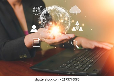 Business woman is holding Global network connection to big data around the world.and tecnology internet metaverse concept.