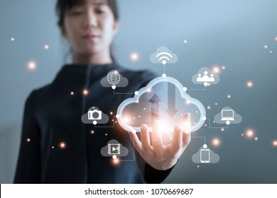 Business woman holding icon cloud computing network and icon connection data information in hand. Cloud computing and technology concept. 
 - Powered by Shutterstock