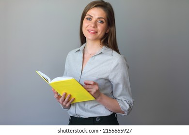 Business Woman Holding Open Yellow Book.