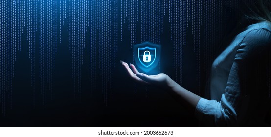 Business woman holding  padlock in hand on binary background. Global networking connection background. Network security and data protection.