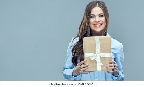 Business Woman Holding Paper Gift Box. Toothy Smiling Face. Isolated Background.