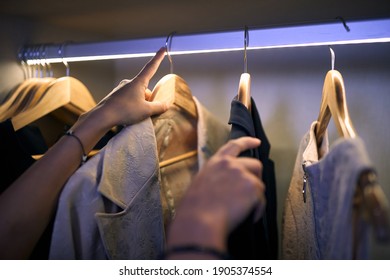 A business woman at hotel room who choosing clothes for work. Business, hotel, people