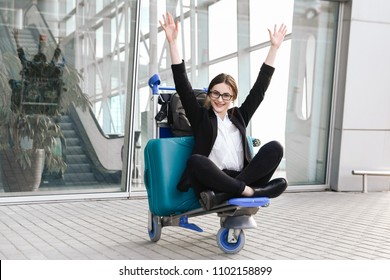 . Business Woman At International Airport Moving To Terminal Gate For Airplane Travel Trip - Mobility Concept And Aerospace Industry Flight Connections