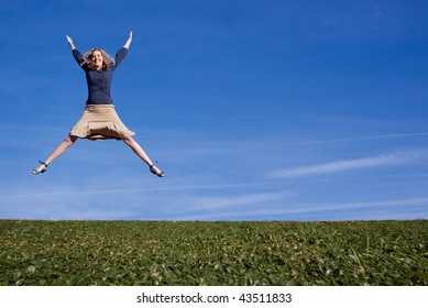 Business woman jumping