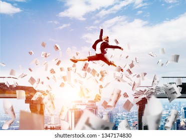 Business woman jumping over gap with flying paper documents in concrete bridge as symbol of overcoming challenges. Cloudly skyscape with sunlight on background. 3D rendering.