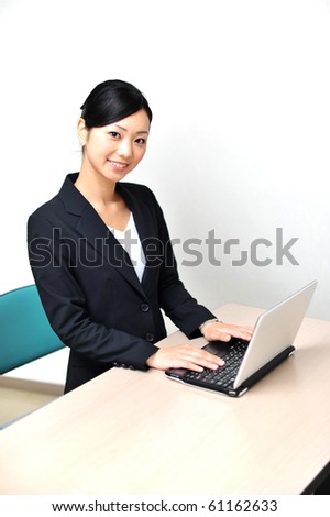 business woman with laptop computer