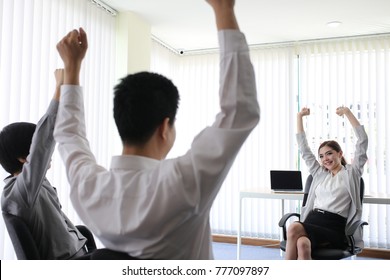 Business Woman Leading People 
 Group Exercise In Office In Morning.