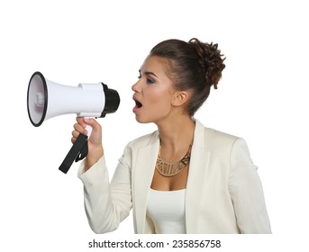 Business woman with megaphone yelling and screaming isolated on white