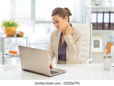 Business Woman With Neck Ache