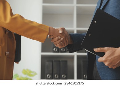 Business woman offer and give hand for handshake in office. Successful job interview. Apply for loan in bank. Salesman, bank worker or lawyer shake for deal, agreement or sale. Increase of salary.