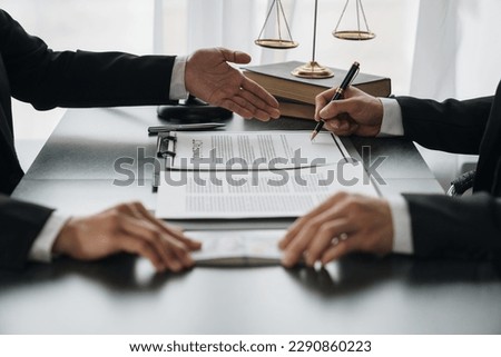 business woman offers bribes to lawyers To help with legal matters in court, bribes corruption illegal fraud bribery concept.