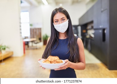 Business Woman In The Office Canteen With Pastries On The Plate With Face Mask Because Of Covid-10