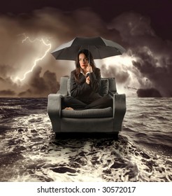 Business Woman On An Armchair Lost In The Sea During A Storm