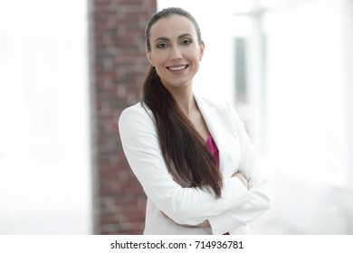 business woman on the background of the office - Shutterstock ID 714936781
