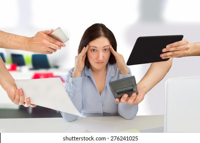 business woman overwhelmed with so much work