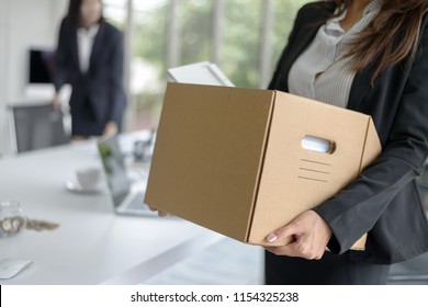 Business Woman Packing Her Belonging After Resign Or Be Fired From Business Company 