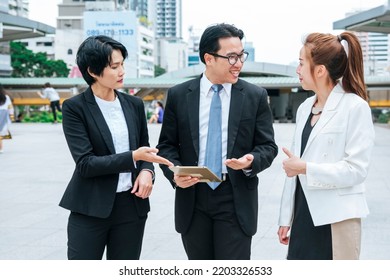 Business Woman Partner Talk, Meeting Team Partnership In Modern City Together. Diversity Asian Business Partner Online Meeting Trust Teamwork. Asian Two Business People Teams Meeting Outdoor In City.