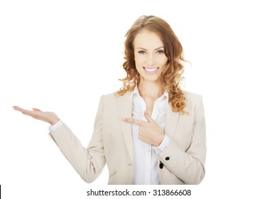 Business Woman Pointing On Her Hand.