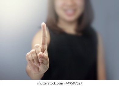 Business Woman Pointing At Something On Screen