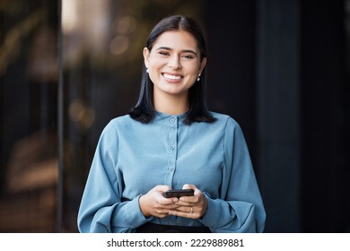 Business woman, portait and smile with phone typing, happy to email or doing online, internet or web search. Career female with mobile smartphone working in social media marketing outdoor in the city