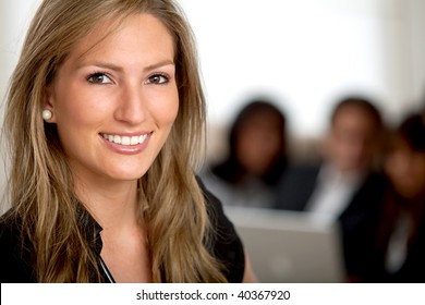 Business woman portrait smiling in an office