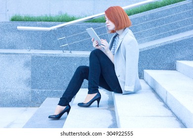 Business Woman Reading Carefully Tablet