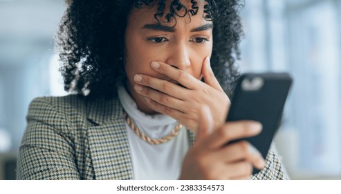 Business woman, reading phone and shocked for news, social media post or marketing error in office. Young african employee confused, surprise and stress on mobile for scam, mistake or wrong email