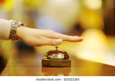 Business Woman  At The Reception Of A Hotel Checking In