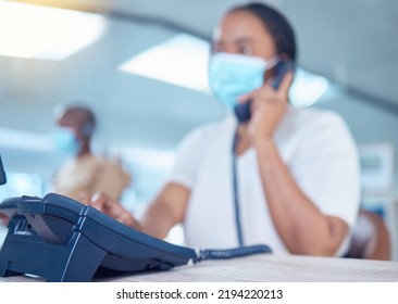 Business Woman Or Receptionist On Phone Call With A Mask For Covid, Corona Or Virus Safety. Company Office Worker In Startup Workplace Consulting Or Communication With Client About Telemarketing