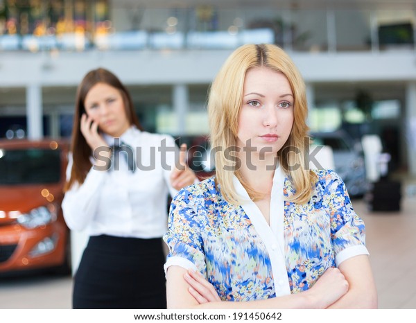business woman resolving problem of\
dissatisfied customer woman by phone. Selective\
focus.