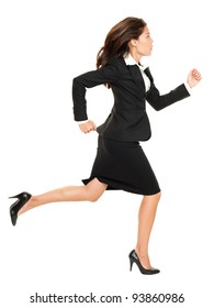 Business Woman Running In Suit In Full Body Isolated On White Background. Business Concept Image With Young Mixed Race Caucasian / Chinese Asian Businesswoman.