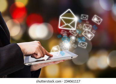 Business woman sending email 