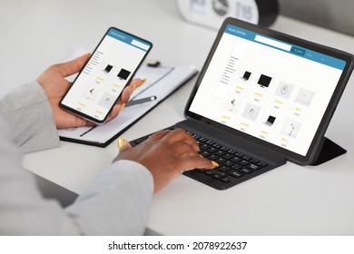 Business Woman Shopping Online. Female Customer Holding Mobile Phone, Using Smart App, Browsing Internet Store Outlet Website, Buying Office Equipment At Discount, Typing On Tablet Keyboard, Close Up