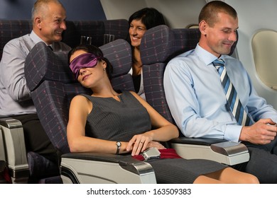 Business Woman Sleep During Night Flight Airplane Cabin Passengers