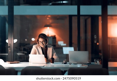 Business woman, smile and laptop in office for corporate communication, internet research and networking. Female person, technology and coffee working late night for project planning and email - Powered by Shutterstock