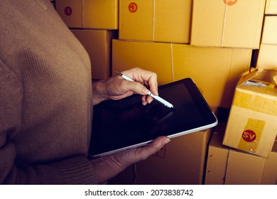 Business Woman Start Up Small Business Entrepreneur SME Success .freelance Woman Working At Home With Online Parcel Delivery. SME And Packaging Deliveryconcept