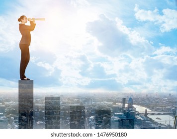 Business Woman Staying On Top On Chart Bar And Looking With The Telescope For The Future Business Opportunities. City Of London Panoramic View At Background. Business, Success And Strategy Concept