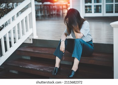 Business Woman Stressed From Work While Sitting Outdoors On The Stairs, Concept Work Life Balance, Burn Out Syndrome, Depression Concept.