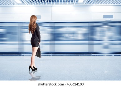 Business Woman In The Subway Station