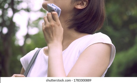 Business Woman Is Sweating Outside