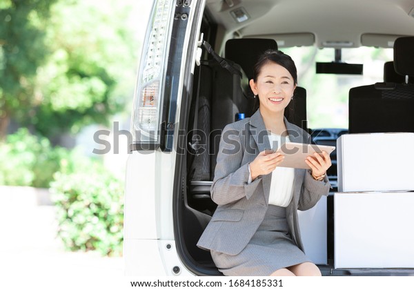 Business woman with tablet\
PC