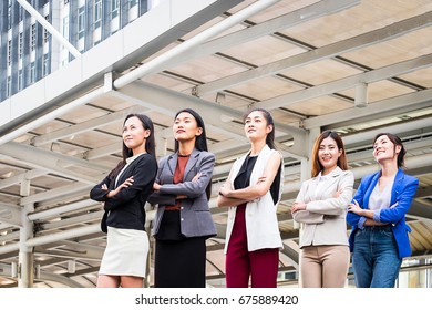 Business woman teamwork success concept - Shutterstock ID 675889420