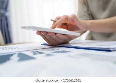 Business Woman Thinking Account, Using Calculator And Laptop On Desk 