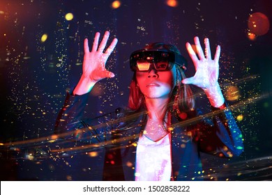 Business Woman Trying Vr Glasses Hololens With Bokeh Background In The Lab. Mixed Reality Fantasy Future Technology Concept.