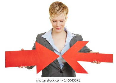 Business Woman With Two Big Red Converging Arrows