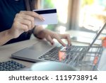 Business Woman use Credit Card to  Shopping Online with Computer Laptop